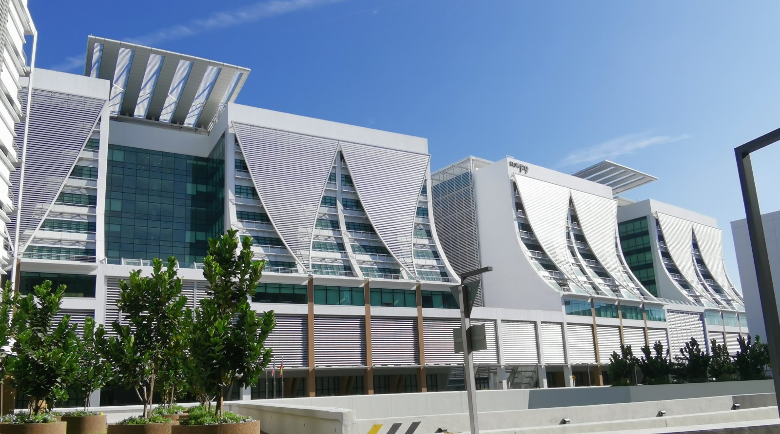 Curved unitized facade of a completed TAIYANG project